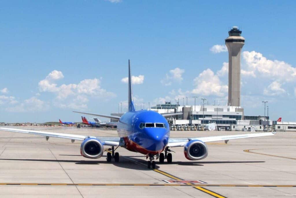 Plane On Runway At Denver International Airport Scaled E1692723091737.jpg